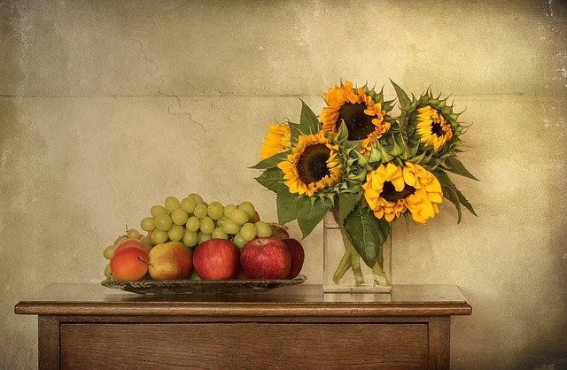 Lammas harvest of sunflowers, grapes, and fruit